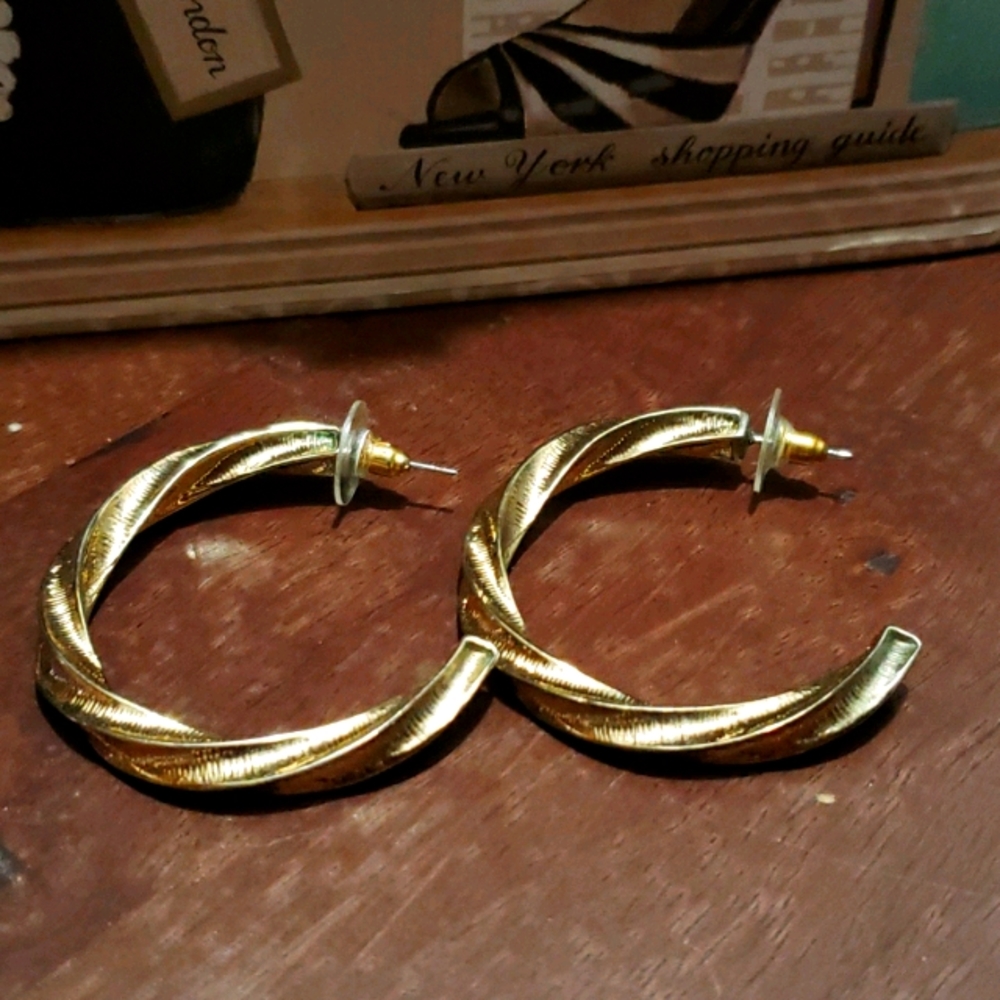 Gold pierced loop earrings